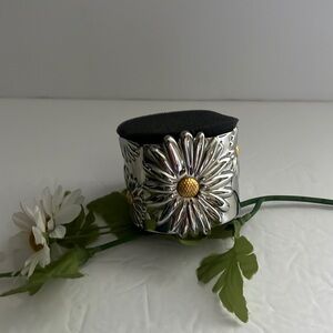 Stainless steel cuff bracelet.